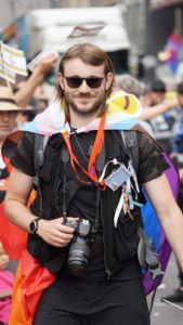 Johannes among a group of people with a camera